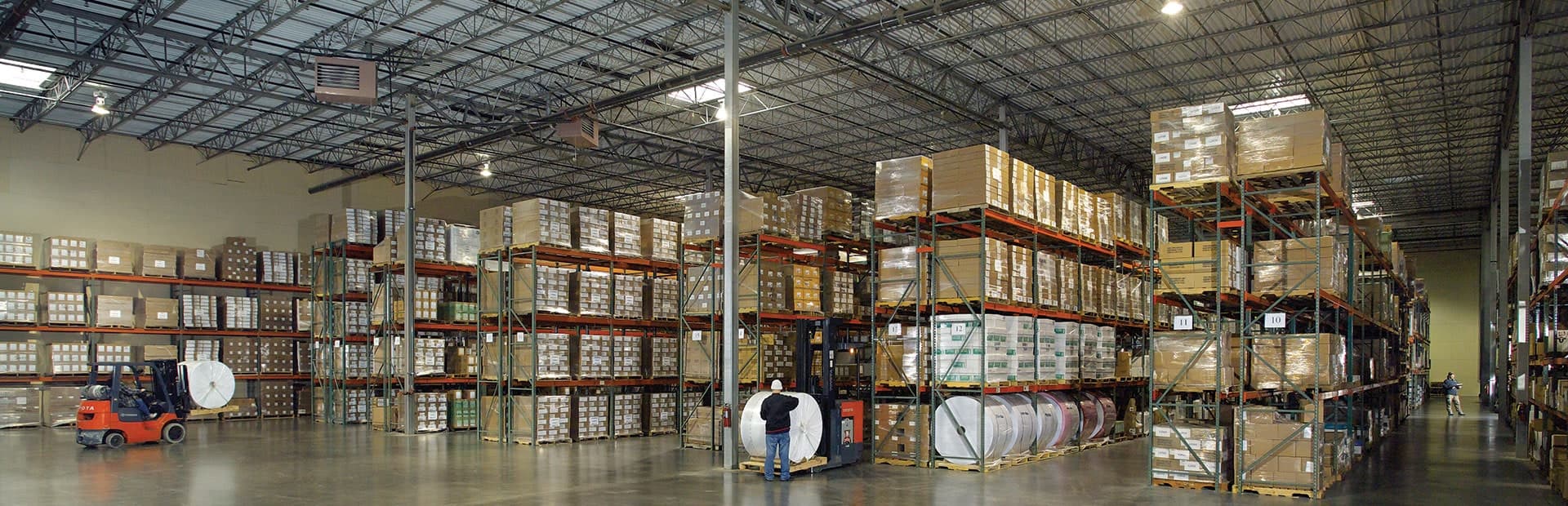 Ecommerce fulfillment warehouse with pick-and-pack stations